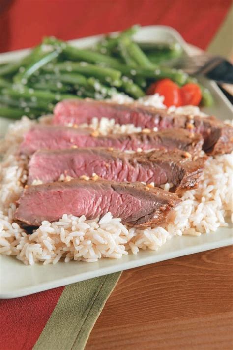 How much fat is in honey-lime flank steak over rice - calories, carbs, nutrition