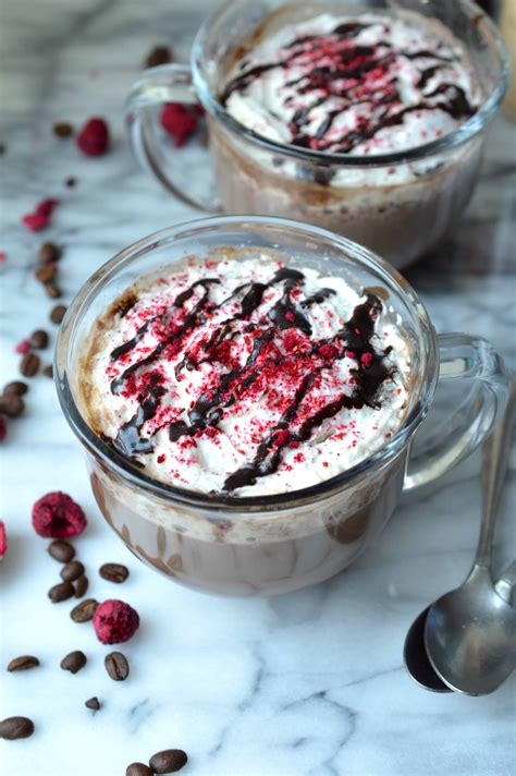 How much fat is in iced raspberry mocha - grande - whole milk - with whipped cream - calories, carbs, nutrition