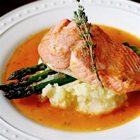 How much fat is in olive oil poached salmon with orange broth, white bean kale, blistered tomato - calories, carbs, nutrition