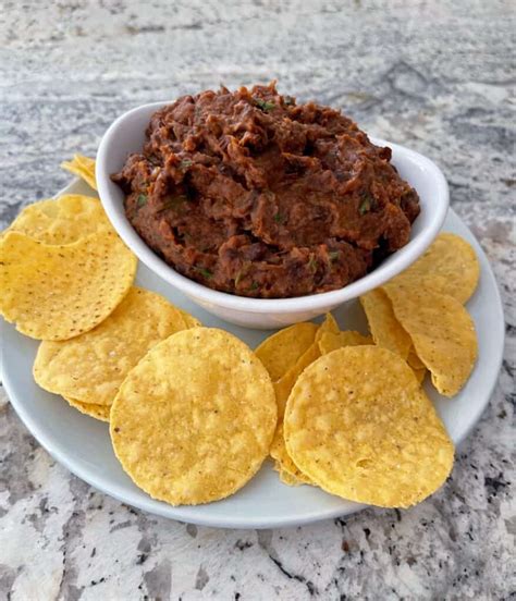 How much fat is in on the border, refried beans - calories, carbs, nutrition