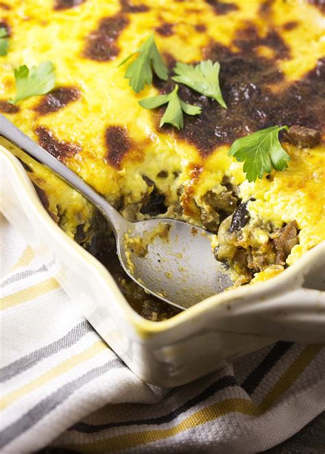 How much fat is in oven baked lamb moussaka with a golden cheese crust, garlic bread & side salad - calories, carbs, nutrition