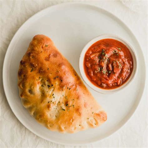 How much fat is in ricotta vegetable calzone marinara (32280.12) - calories, carbs, nutrition