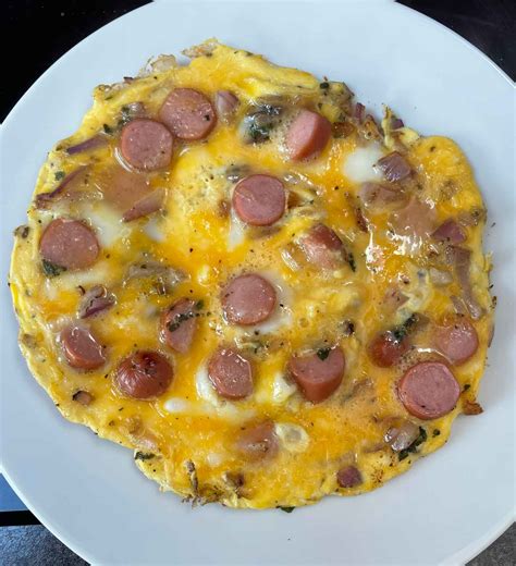 How much fat is in sand brkf hot dog bun omelet spicy sesame vegetables - calories, carbs, nutrition