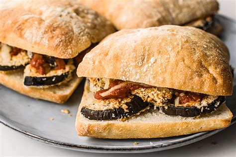 How much fat is in sand flatbread eggplant parmesan 1/2 sandwich - calories, carbs, nutrition