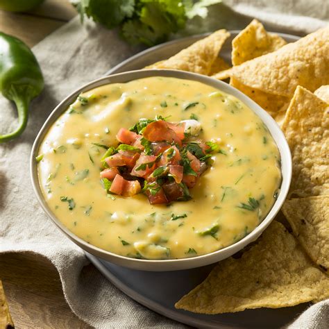 How much fat is in sauce chile con queso quick start 1 oz - calories, carbs, nutrition