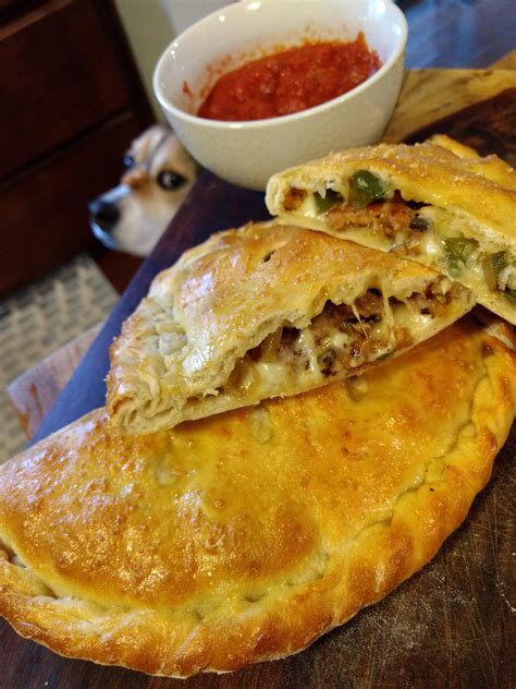 How much fat is in sausage onion pepper calzone - calories, carbs, nutrition