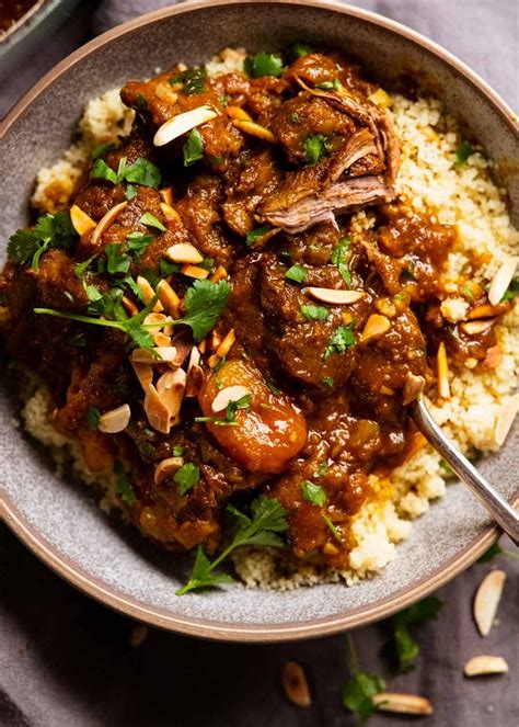 How much fat is in slowly cooked lamb tagine with parsley & mint cous cous - calories, carbs, nutrition