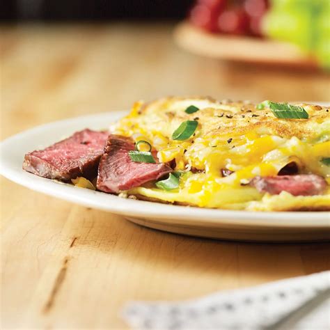 How much fat is in sriracha steak omelet & roasted potatoes - calories, carbs, nutrition