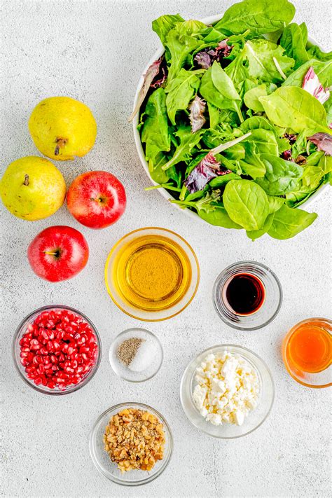 How much fat is in tender greens, pear, walnut, pomegranate seeds, raspberry vinaigrette - calories, carbs, nutrition
