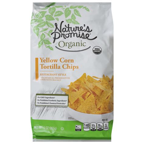 How much fat is in tortilla chips yellow baked 1 oz - calories, carbs, nutrition