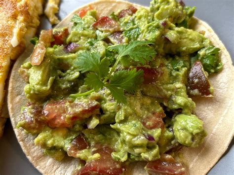 How much fat is in tostada with guacamole - calories, carbs, nutrition