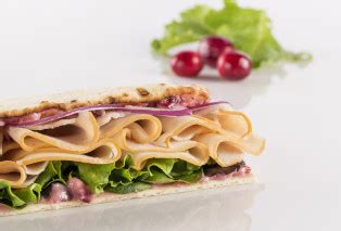 How much fat is in turkey flatbread with cranberry mayo - calories, carbs, nutrition