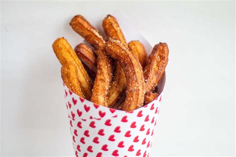 How much fat is in warm churros coated in cinnamon sugar & served with chocolate sauce - calories, carbs, nutrition