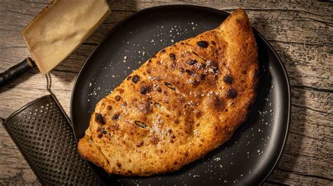 Chicken, Artichoke and Spinach Calzone - calories, carbs, nutrition