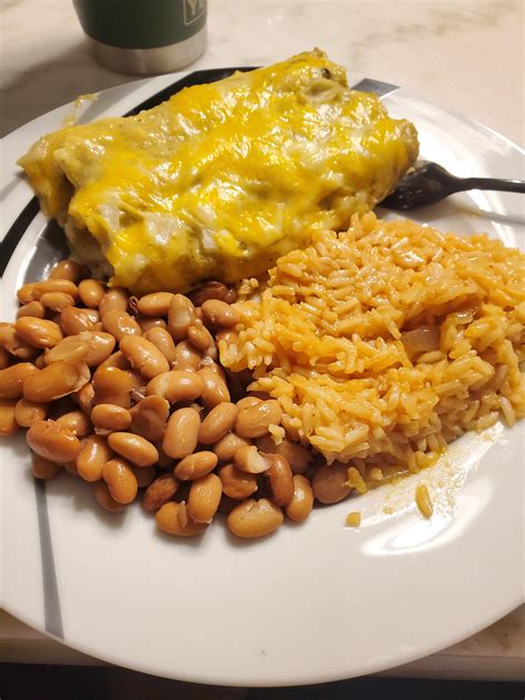 Chicken Enchiladas with Pinto Beans and Mexican Rice - calories, carbs, nutrition