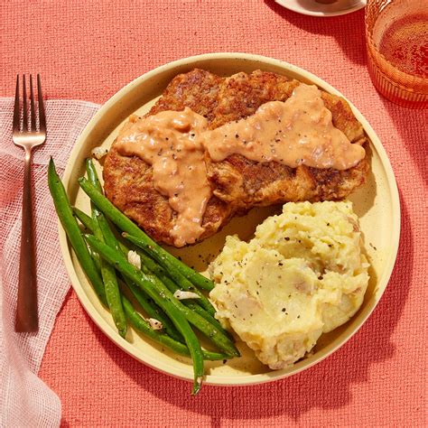 Chicken Fried Steak with mashed potato, gravy and vegetable - calories, carbs, nutrition