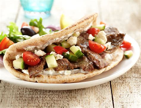 Combo Grilled Lamb Pita Greek Potatoes & Aioli Tzatziki & Greek Salad - calories, carbs, nutrition