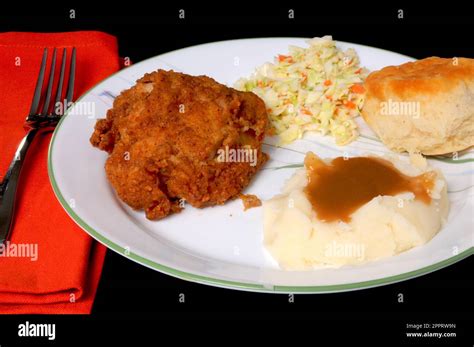 Fried Chicken with mashed potato, gravy, vegetable and dinner roll - calories, carbs, nutrition