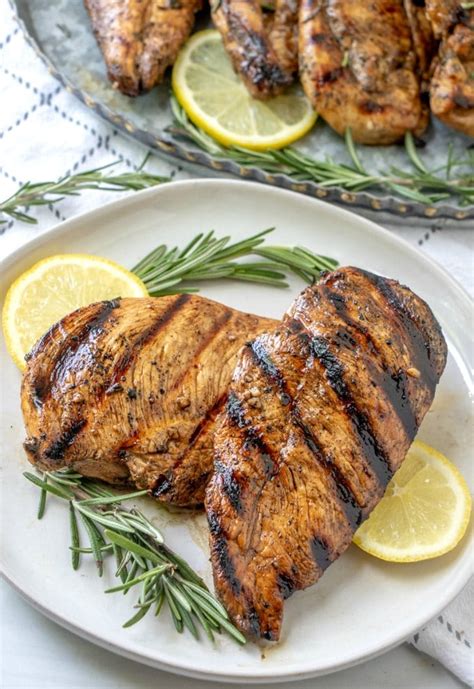 Grilled Balsamic Herb Marinated Chicken Breast topped with Golden Tomato Caaponata - calories, carbs, nutrition