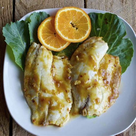 Poached Tilapia withOrange Sauce, Citrus Oregano Brown Rice Romaine Salad withOrange - calories, carbs, nutrition