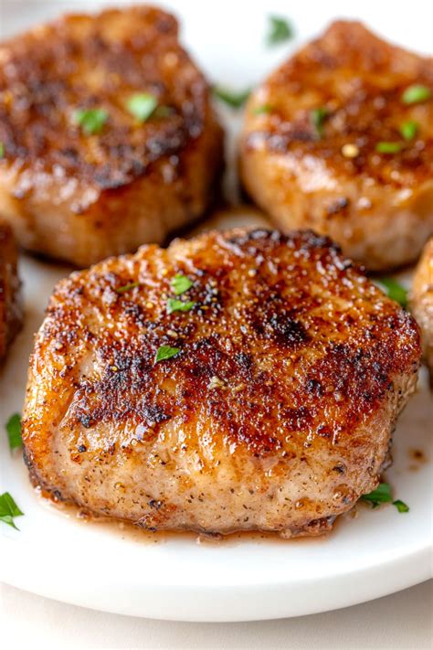 Pork, fresh, loin, center rib (chops), boneless, separable lean only, cooked, broiled - calories, carbs, nutrition