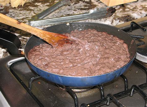 Refried beans, canned, traditional style (includes USDA commodity) - calories, carbs, nutrition