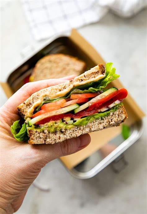 Roasted Red Pepper Hummus and Spinach-Artichoke Sandwich with Baby Carrots - calories, carbs, nutrition