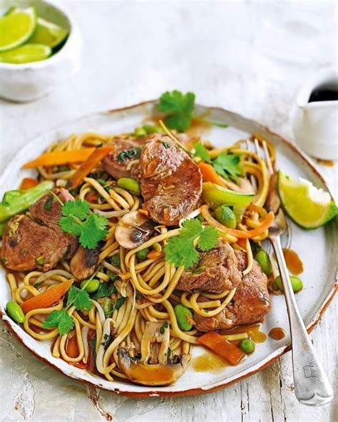 Stir-Fried Pork in a Lime, Soy and Hoi Sin Sauce served with Egg Noodles - calories, carbs, nutrition