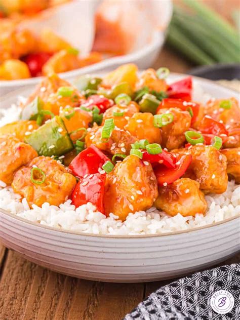 Sweet Sour Pork over Steamed Rice in a Bowl - calories, carbs, nutrition