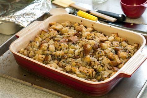 Thanksgiving Feast with mashed potato, gravy, stuffing, vegetable and slice of pie - calories, carbs, nutrition