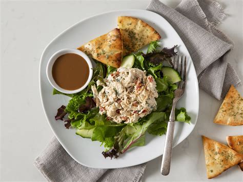 Tuscan Chicken Pita with Sun-Dried Tomato Vinaigrette and Cauliflower Salad - calories, carbs, nutrition