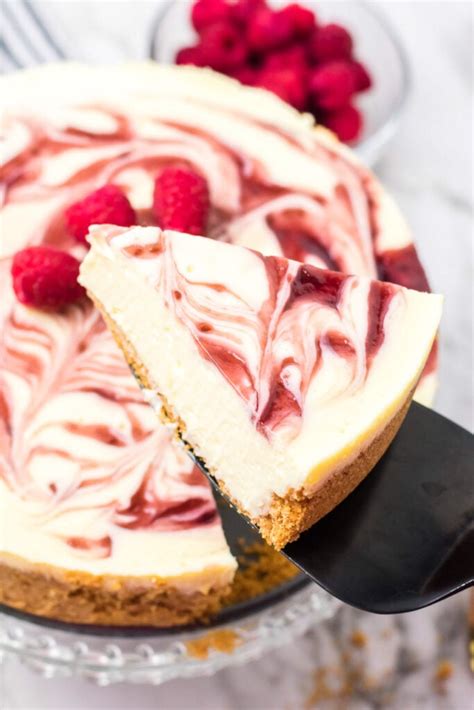 White Choc & Raspberry Cheesecake with double Cream - calories, carbs, nutrition