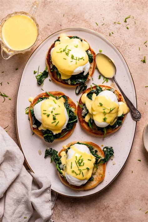 Wilted Spinach, Poached Eggs and a Creamy Hollandaise Sauce on Toasted Muffins - calories, carbs, nutrition